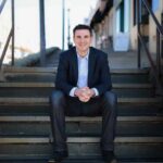 ben debow sitting on stairs
